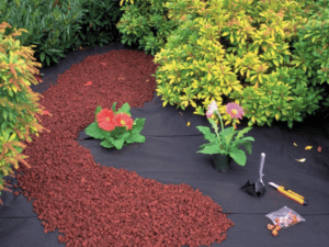 woven ground cover fabric commercial grade with tools and plants commercial landscape fabric