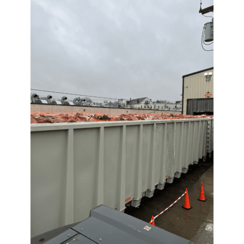 orange safety netting debris netting crushed car netting over container application